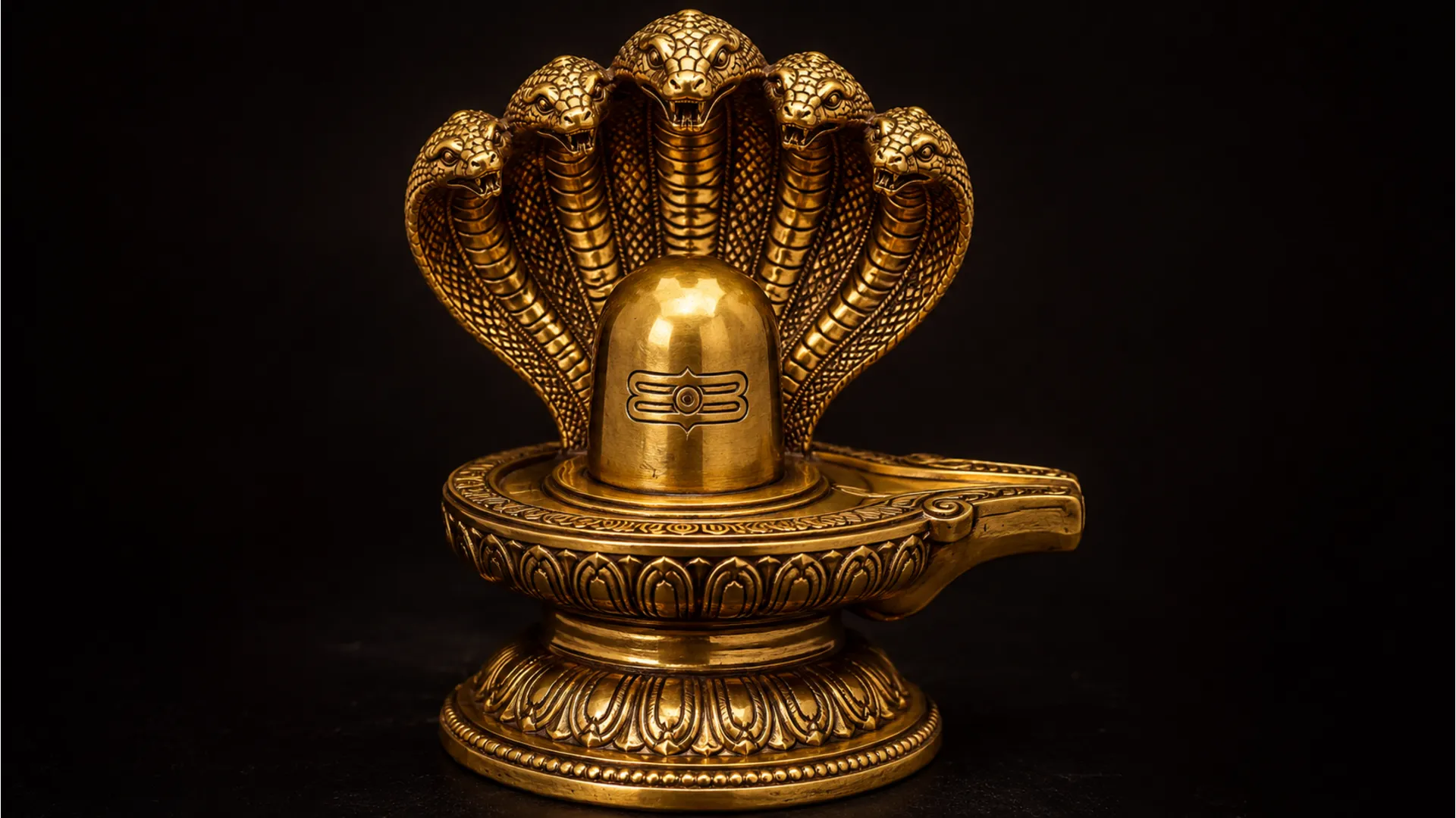 Polished golden brass Shivling featuring an intricate multi-headed Sheshnag canopy.