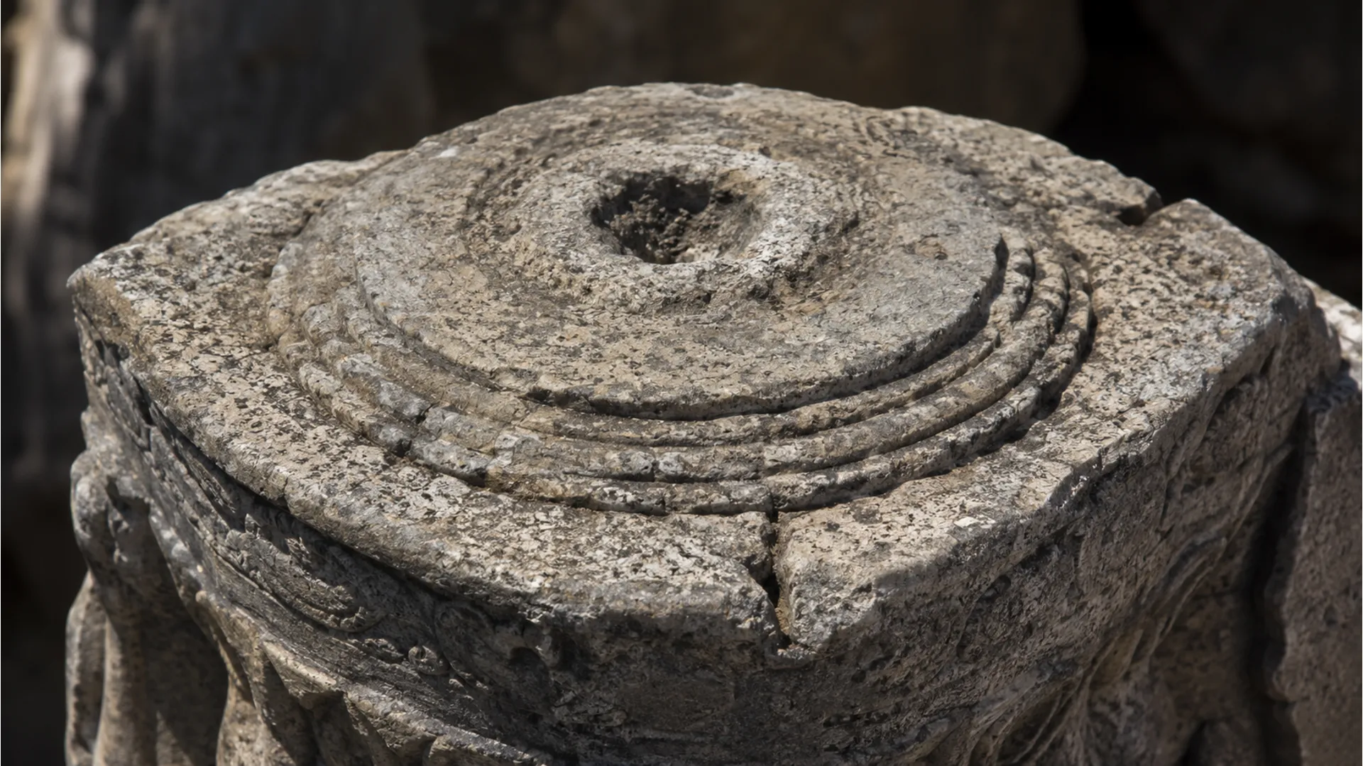Close-up Full HD image of the top surface and distinct carvings on the Gyanvapi stone structure.