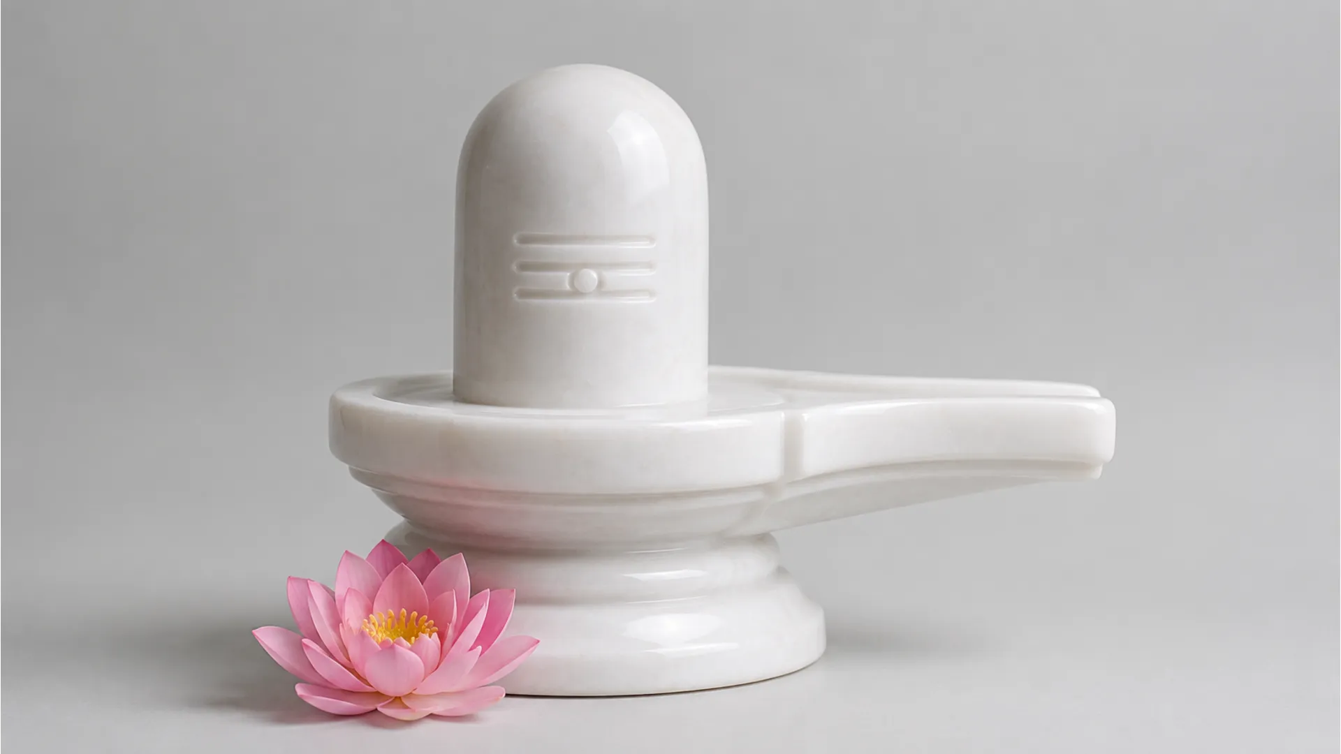 Clean minimalist pure white marble Shivling placed on a serene background.