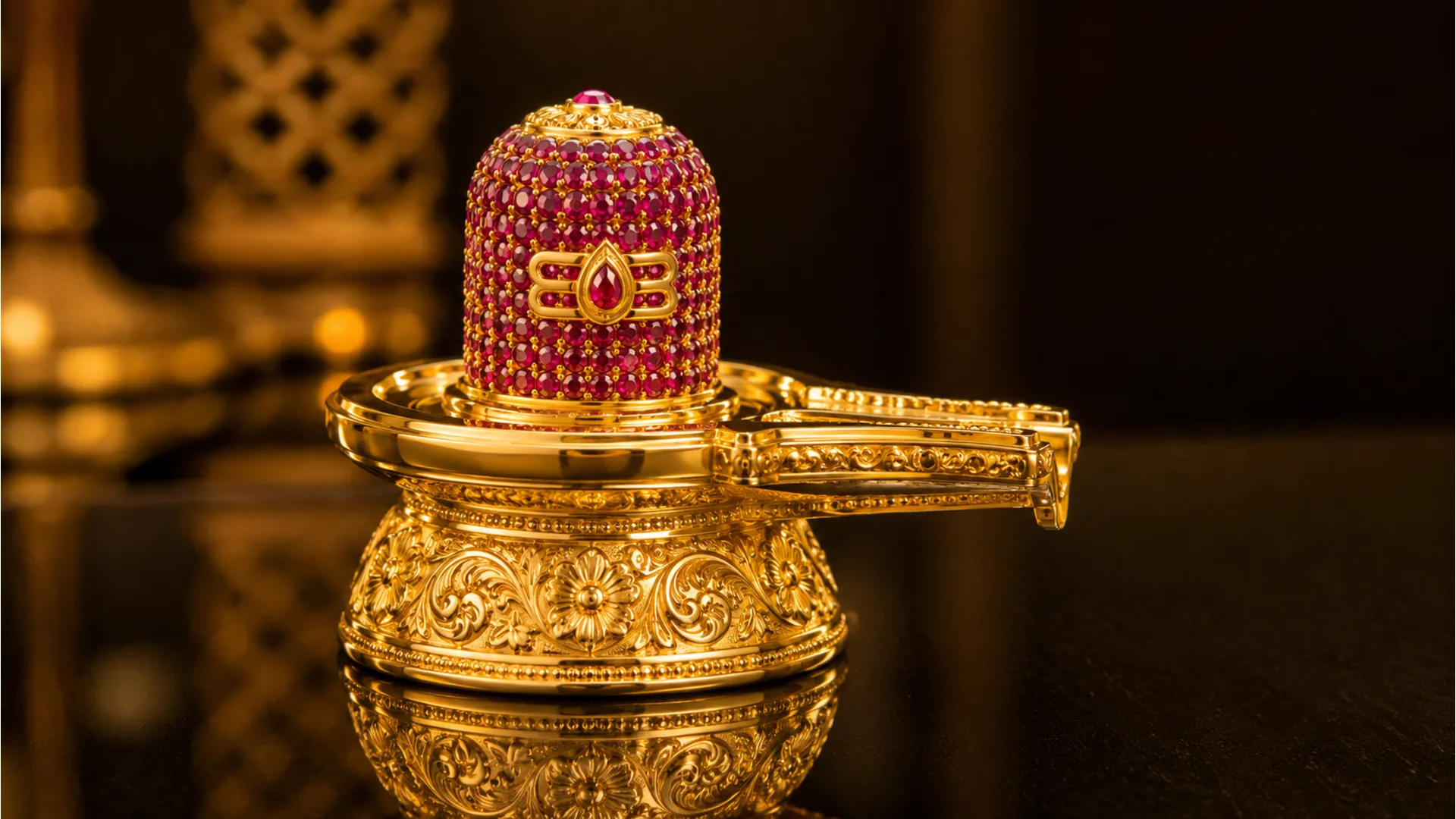 Luxurious royal shivling images full hd crafted with pure gold and embedded red ruby gemstones.