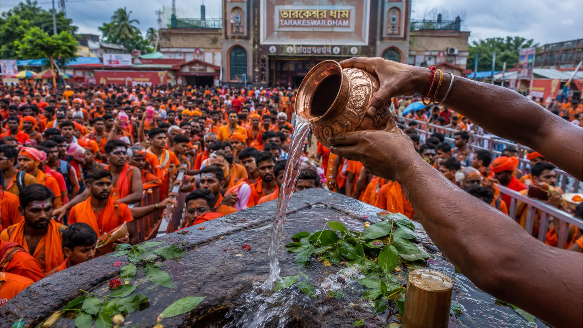 Tarakeswar shivling image depicting pilgrims offering holy Ganges water during Shravan Maas.