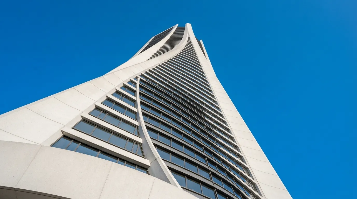 A minimalist architectural photograph focusing on the geometric curves of Shivling Building.