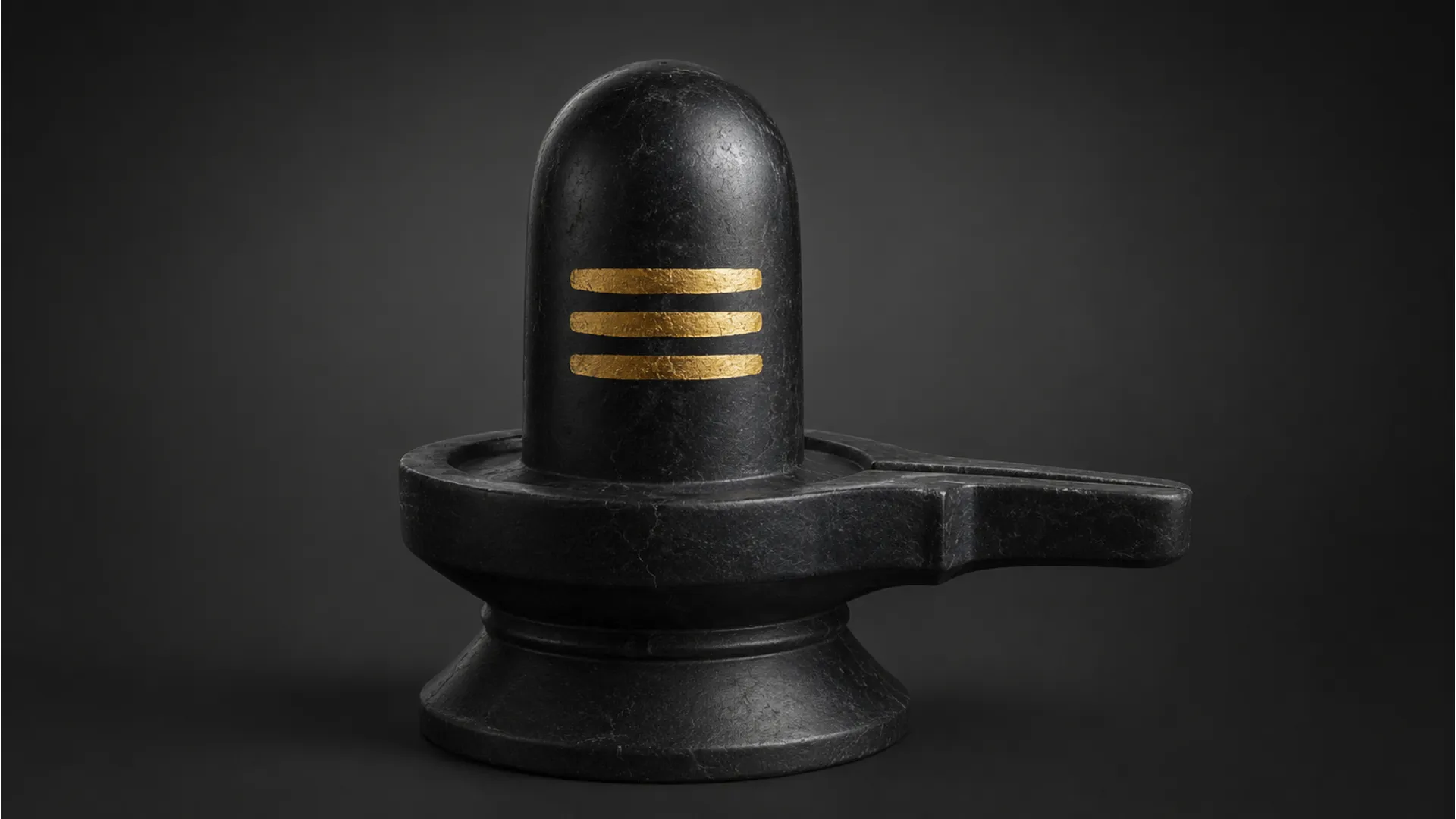 Minimalist desktop wallpaper showing a smooth black marble shivling with subtle gold metallic details.